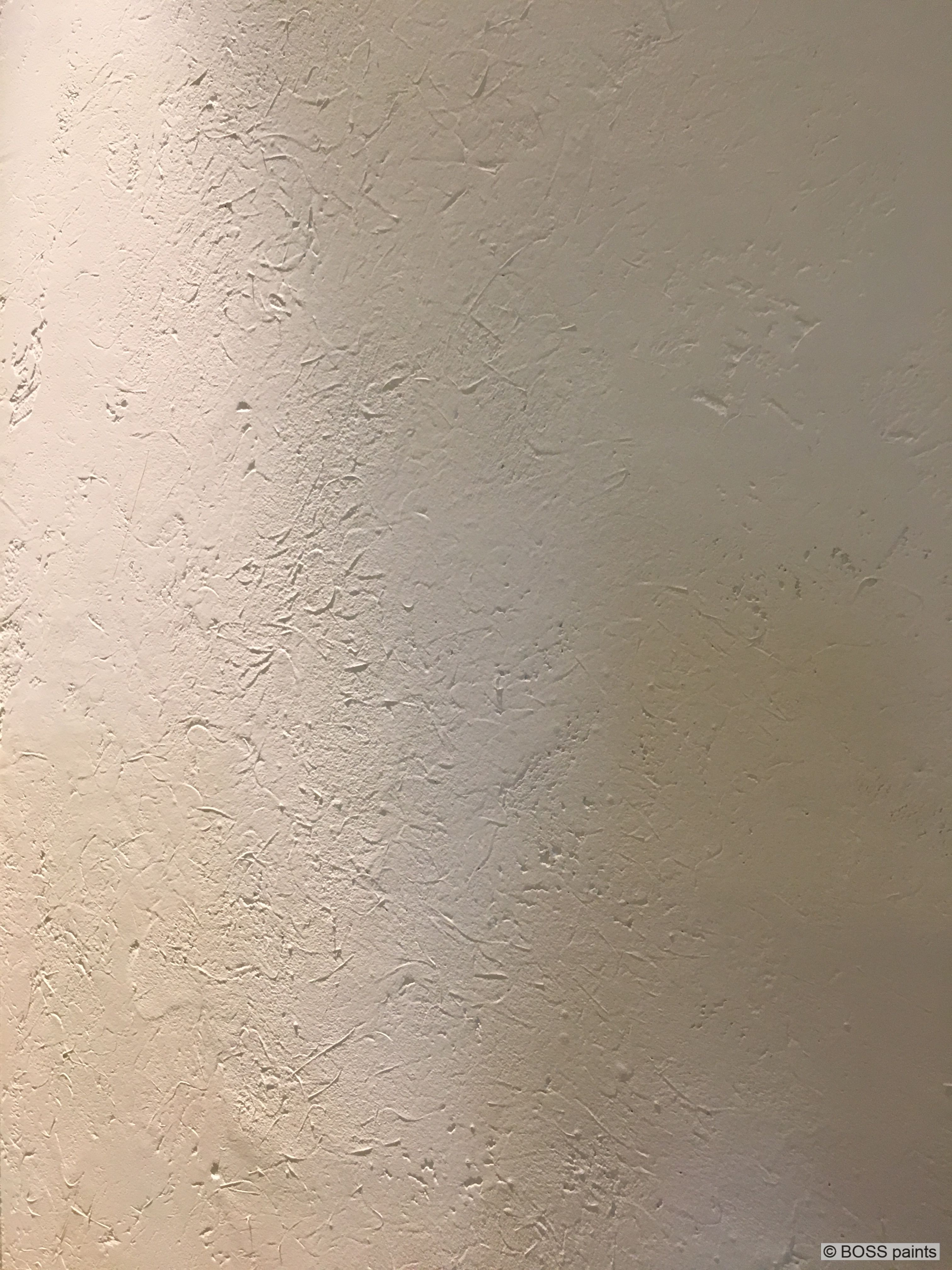Claystuc Original kleistuc in gebroken wit met zacht reliëf op een binnenwand